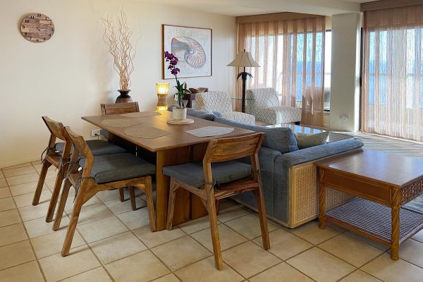open dining room and living area with unobstructed ocean view